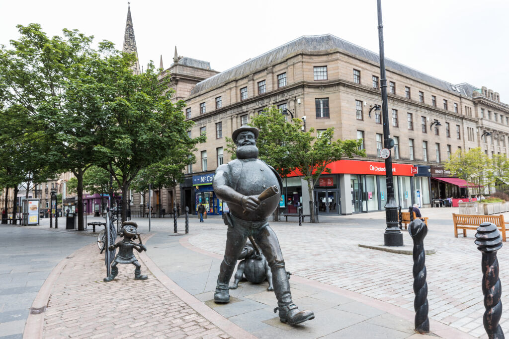 Dundee, Scotland, UK - 06-21- 2019: Desperate Dan and other character Statues within Dundee city Centre 