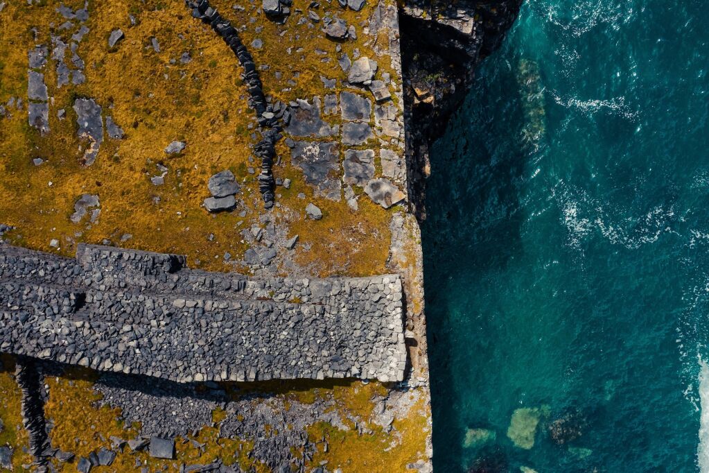 Top down view on a rough stone surface of a cliff by the ocean. Top down view. Aran island, county Galway, Ireland. Irish landscape.