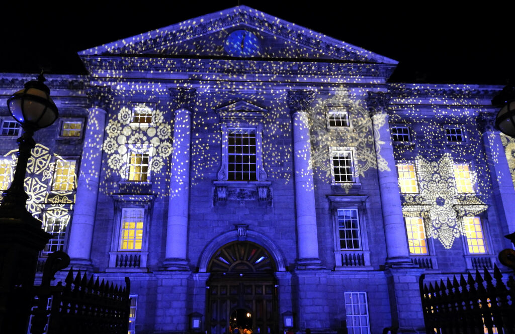 7th December 2018 Dublin. Winter Lights Dublin City features the lighting of Dublin's iconic buildings during Christmas. This image features Trinity College on College Green.