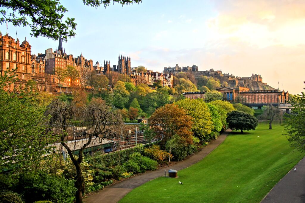 View of old Edinburgh, Scotland at sunset from Princes Street Gardens