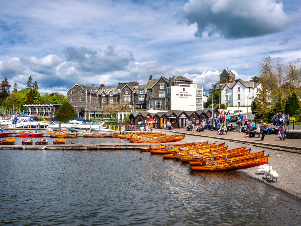Bowness on Windermere Cumbria England 14th May 2014 showing a collection of tourist's rowing boats for hire. 